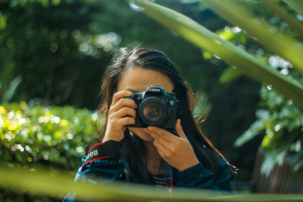 Girl Holding a Camera